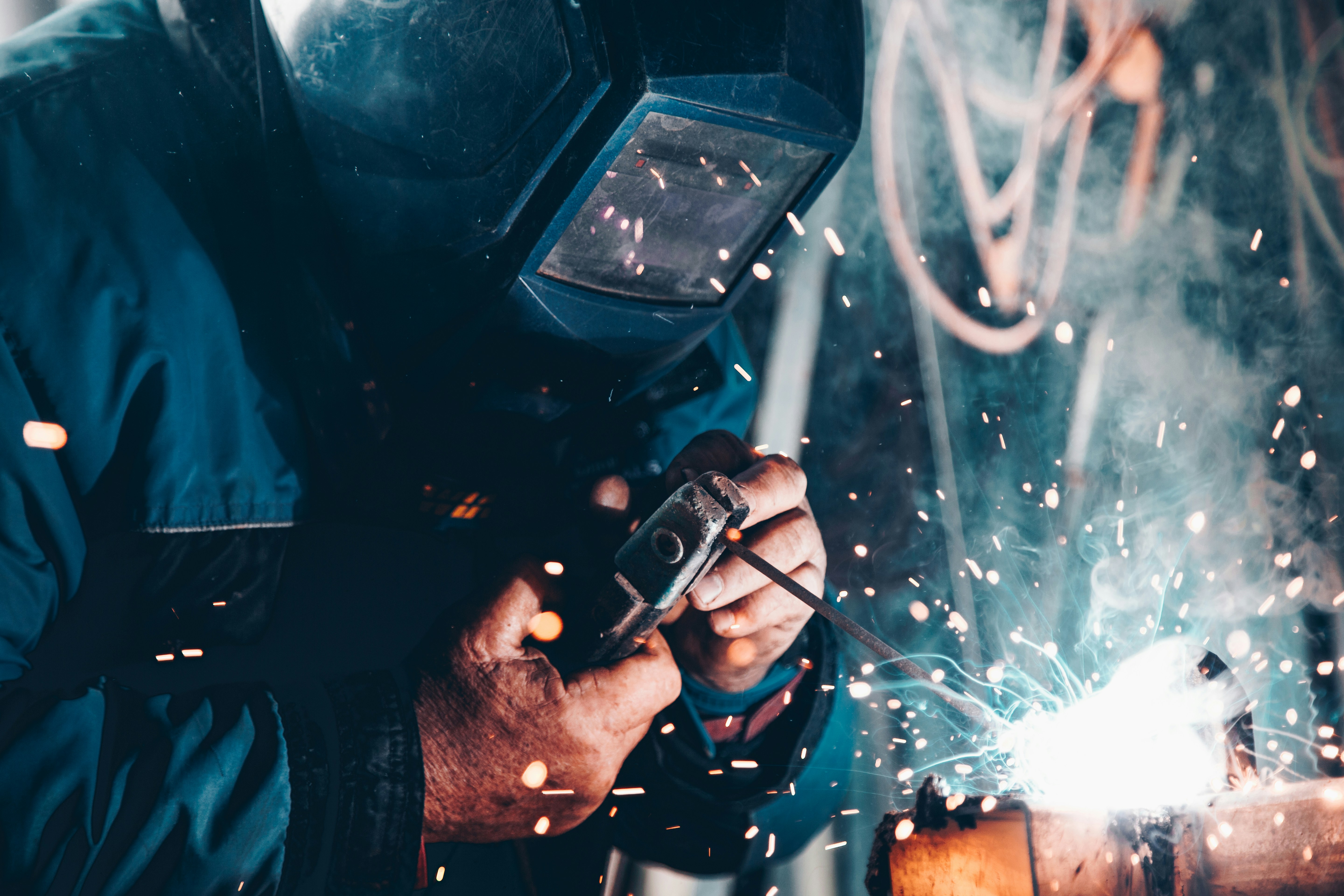 Welding and fabrication training in an industrial workshop